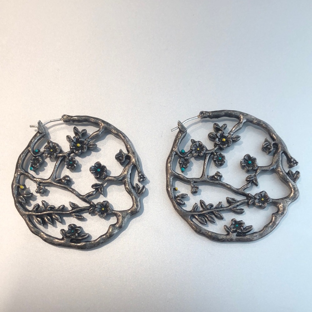 Vintage silver tone hoops with flowers.   Heavy.  Boho. Yellow and blue detail